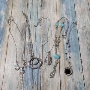 Necklaces silver tone.